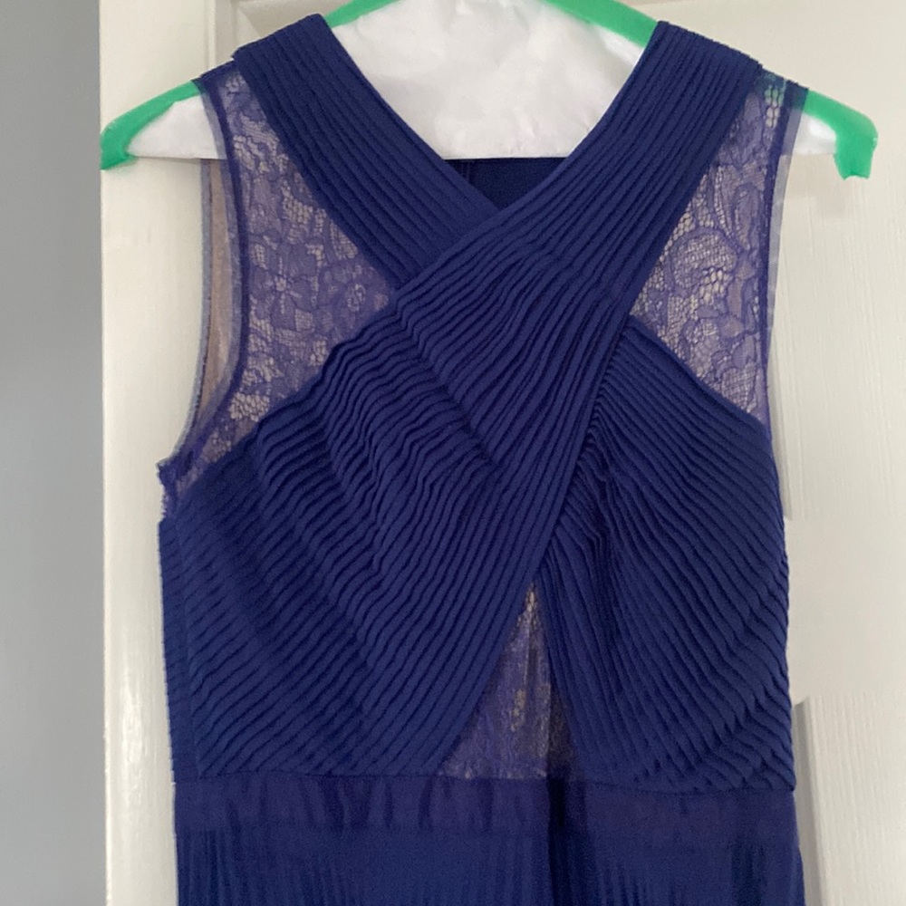 BCBG maxazria navy formal gown in size 4. Worn a handful of times.